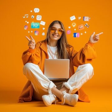 woman-is-sitting-floor-with-laptop-his-legs-plain-background